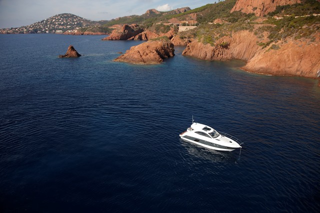 A motor yacht in a quiet bay